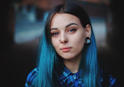 Portrait of Young girl with blue hair